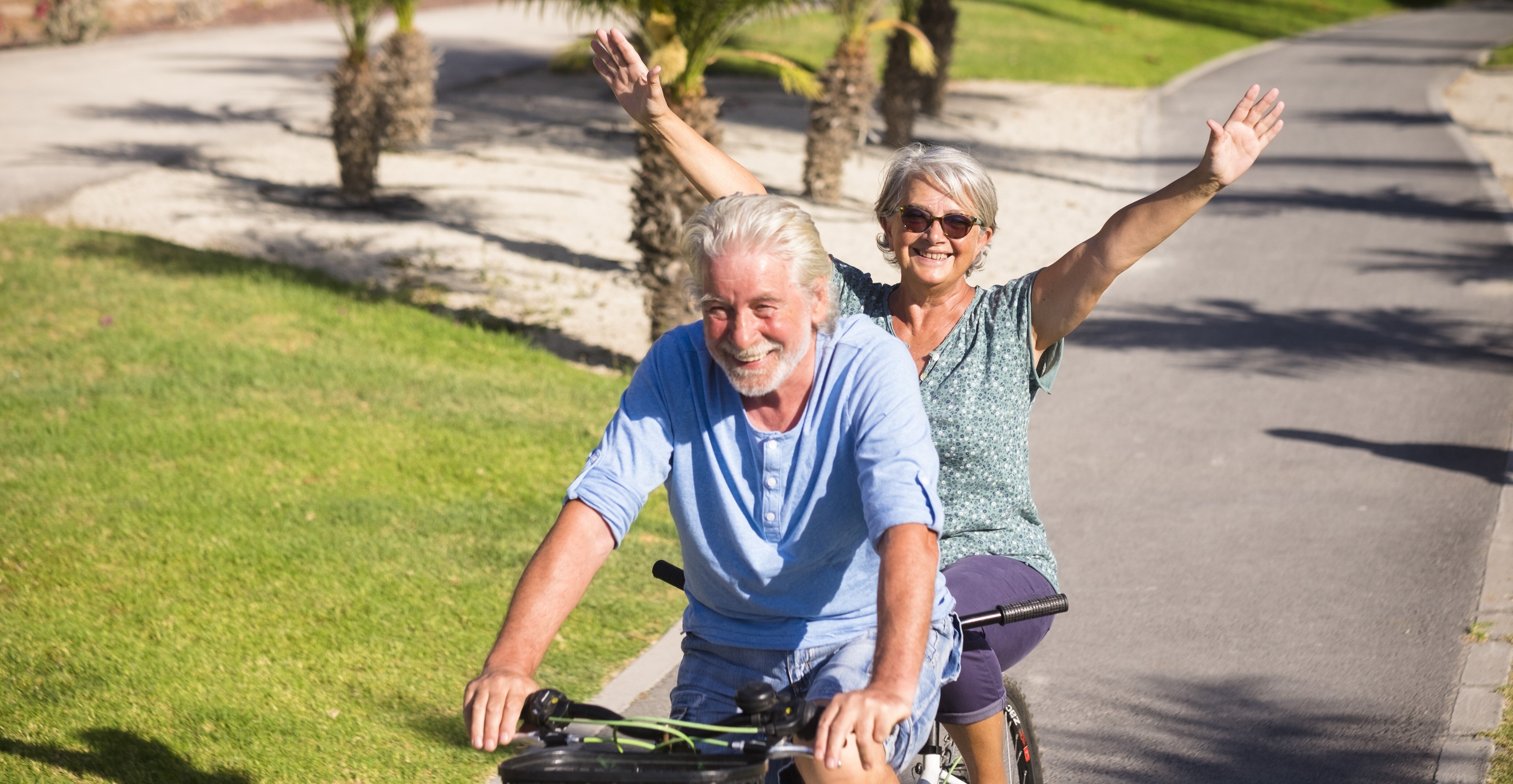 beautiful-couple-senior-mature-married-riding-doble-bike-tandem-together-have-fun-with-great-sunny-day-woman-man